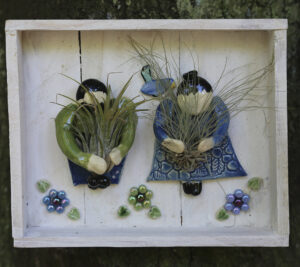 air plant figures on crate