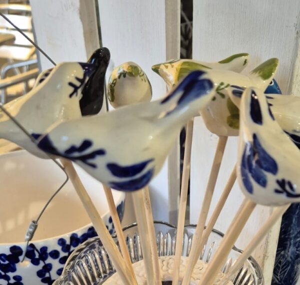 Bird on stick